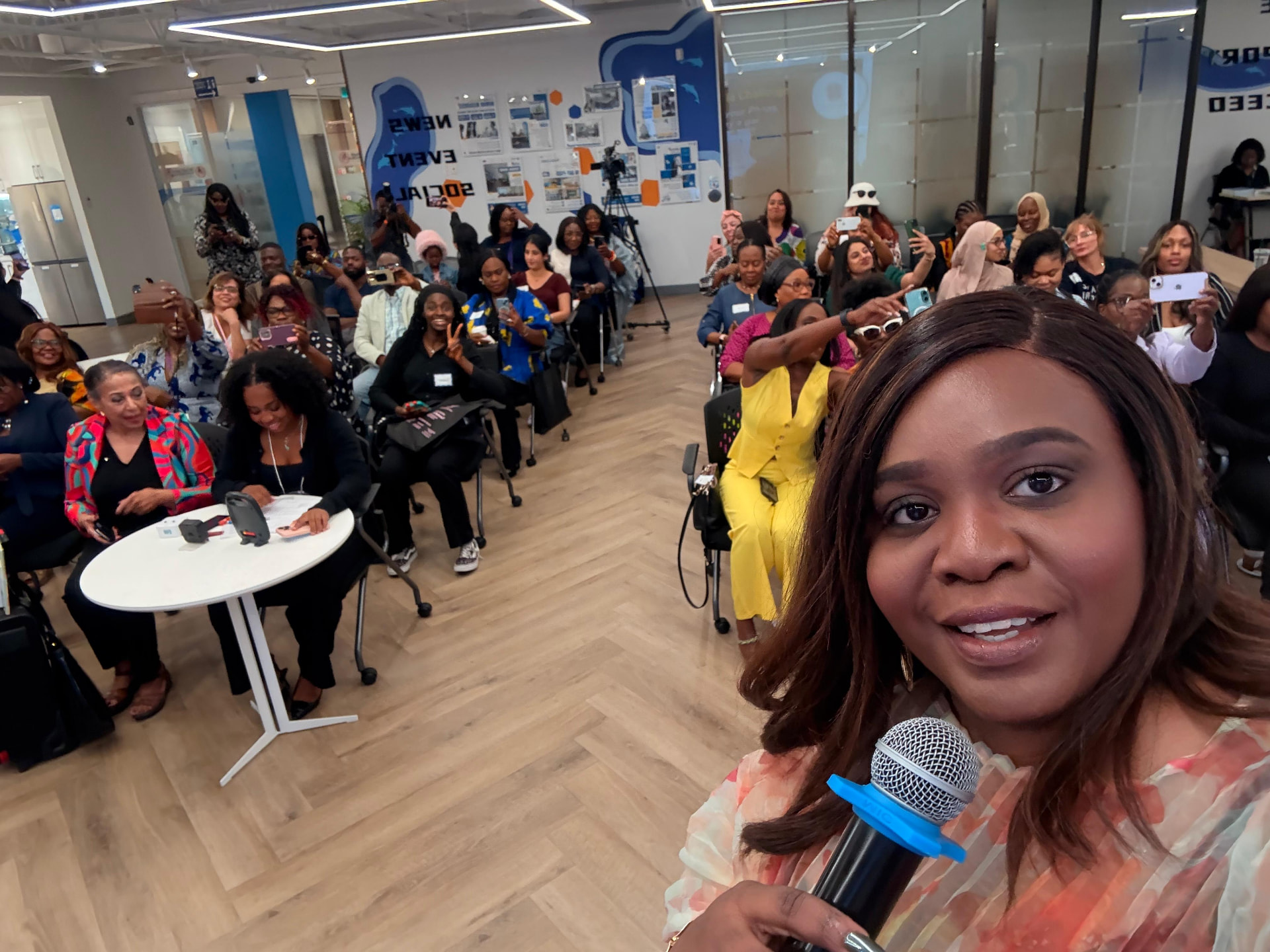 Abimbola Akinnuoye speaking to an audience at a professional gathering